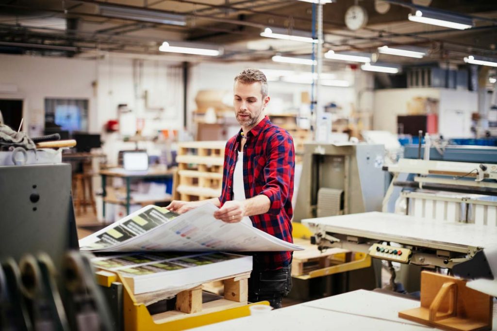 commercial printer at printing press