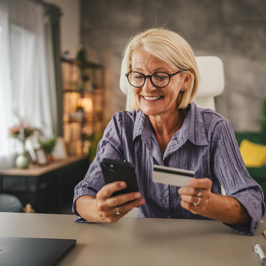 woman in glasses purchasing online